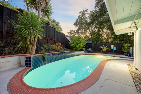 a view of a house with a street