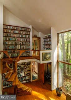 a room with gym equipment and a window