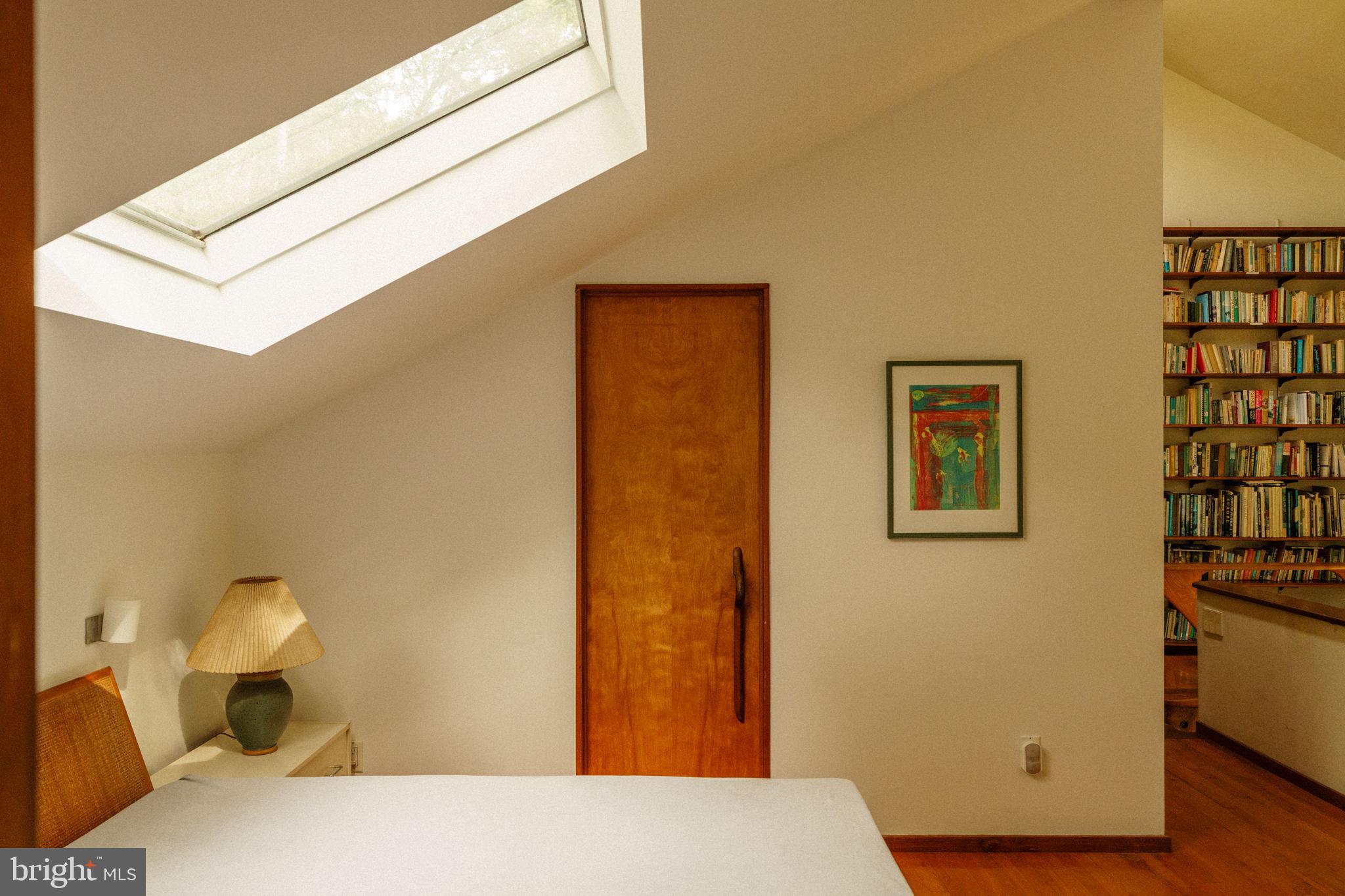 36 Rabbit Run Road Malvern, PA 19355 - Photo 38 of 86 a bedroom with a bed and a wall painting