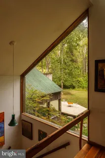 a room with lots of wooden furniture