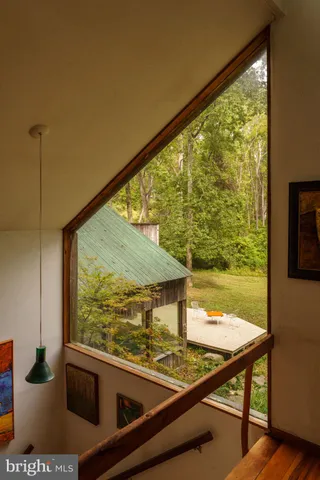 a room with lots of wooden furniture