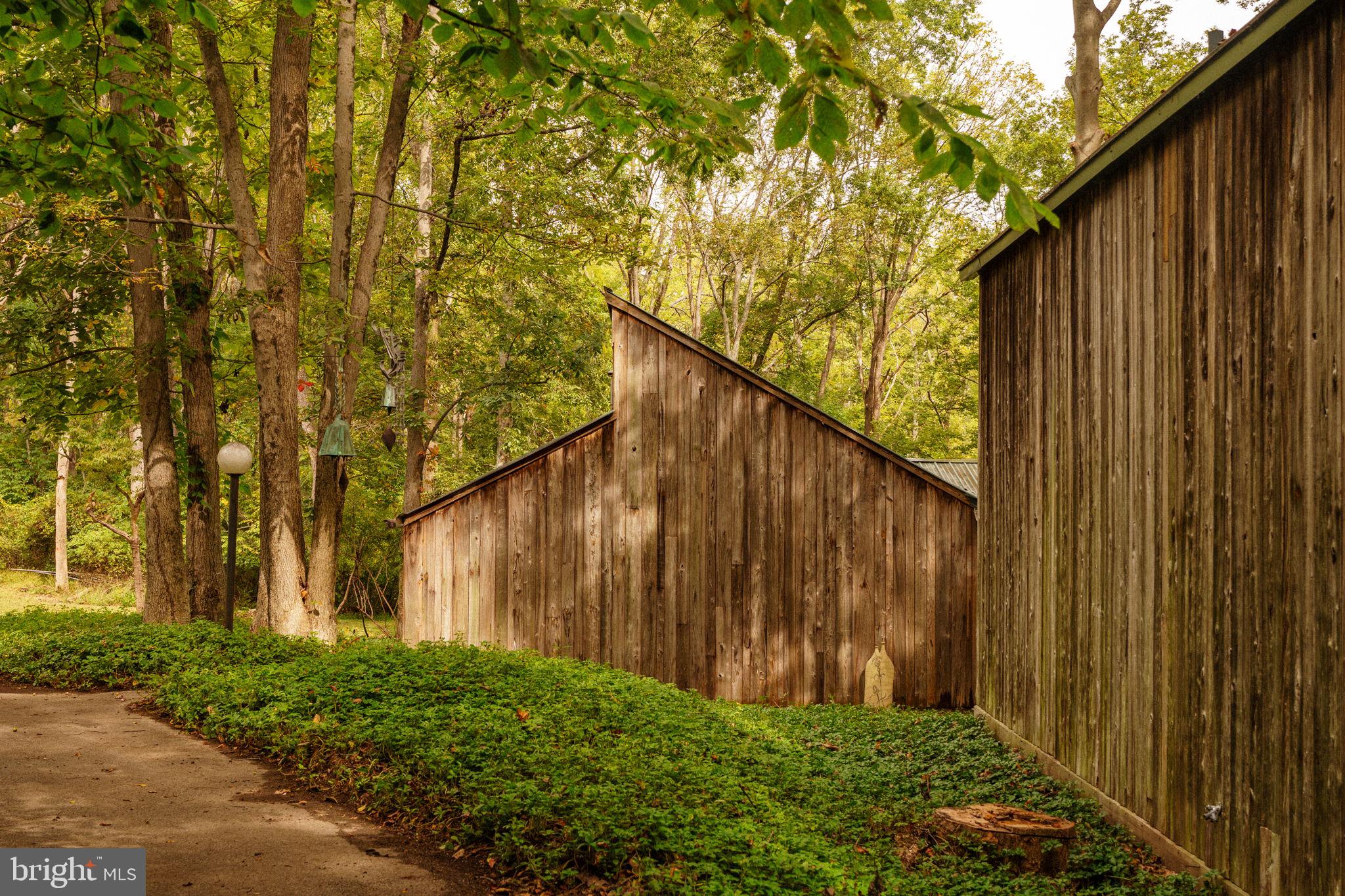 36 Rabbit Run Road Malvern, PA 19355 - Photo 82 of 86 a backyard of a house with lots of green space