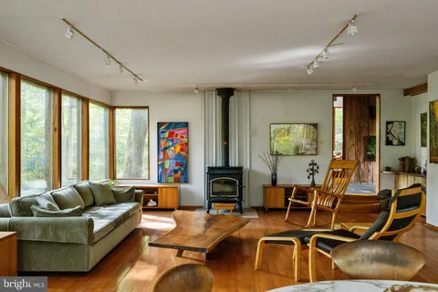 a view of a living room and dining room