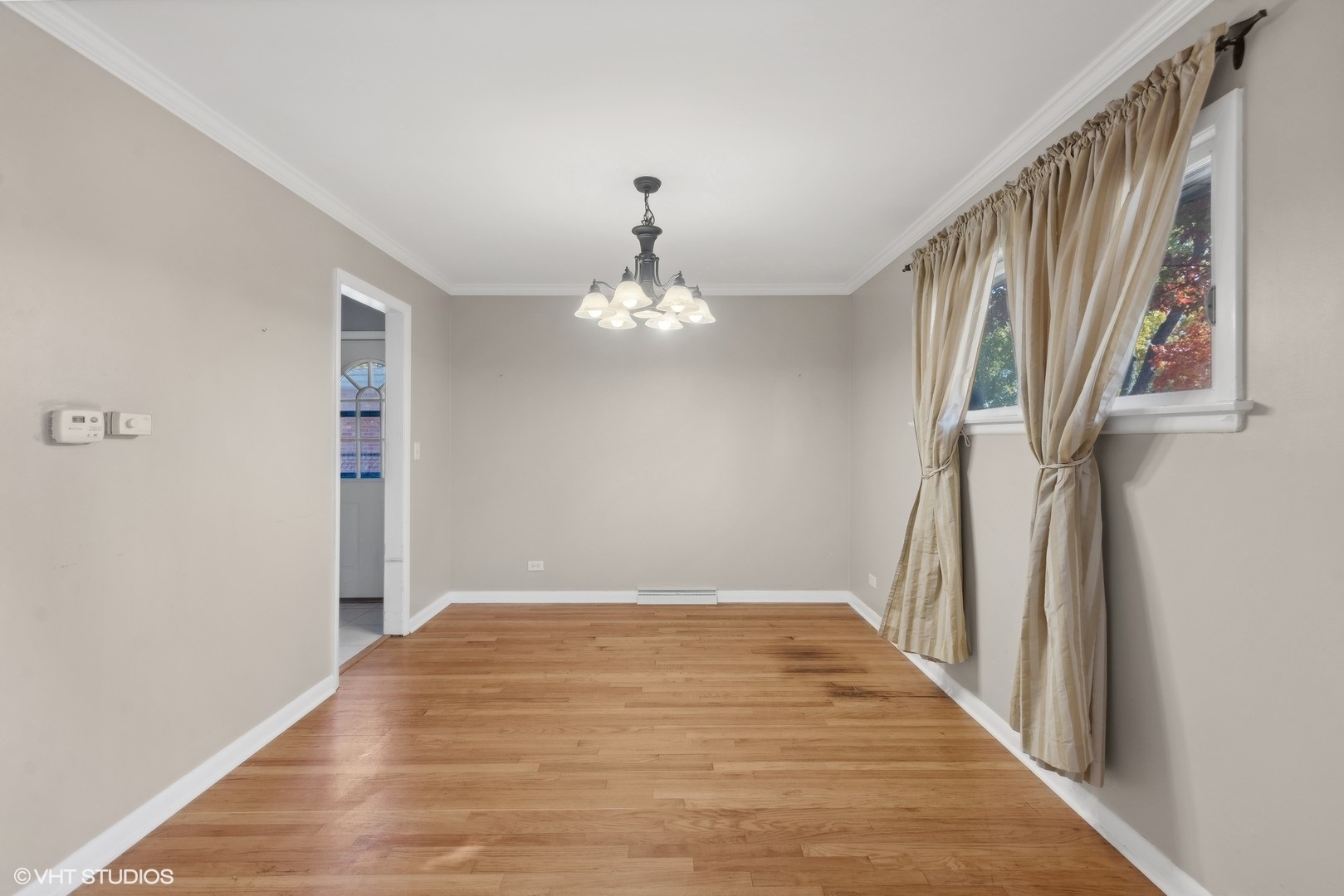 1521 Lakeside Drive Wheaton, IL 60187 - Photo 4 of 17 wooden floor in an empty room with a window
