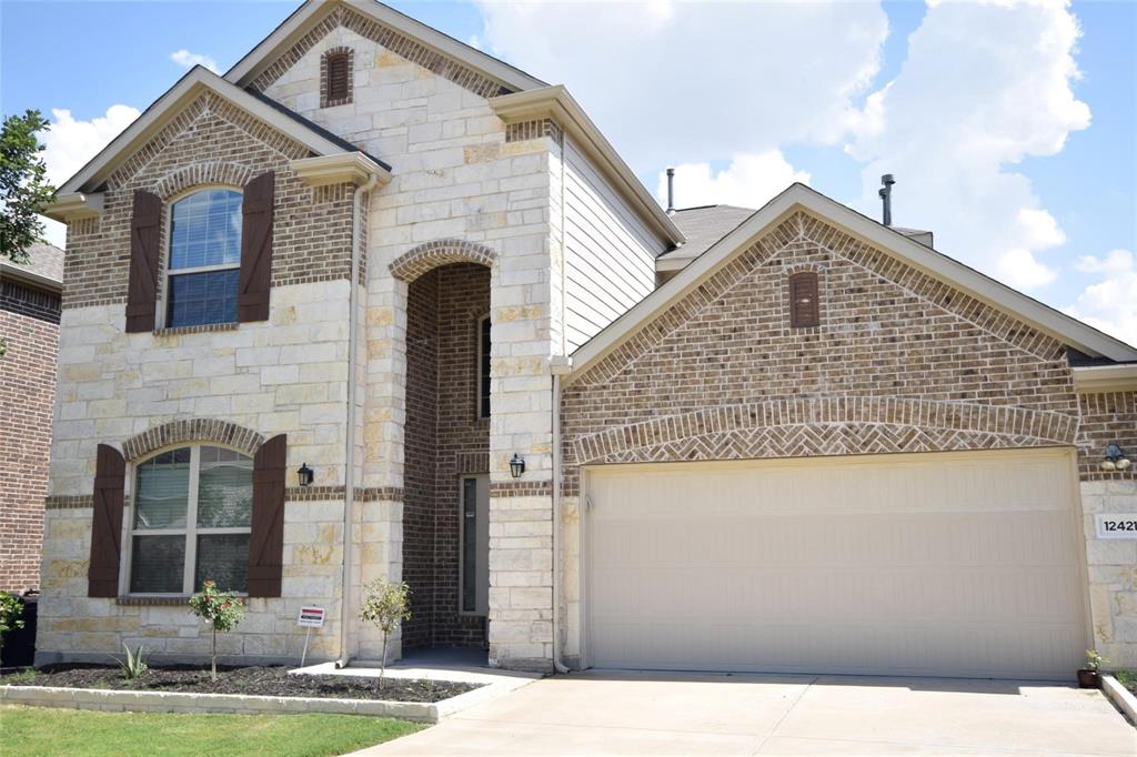 12421 Hitch Rack Way McKinney, TX 75071 - Photo 1 of 21 a front view of a house with a yard