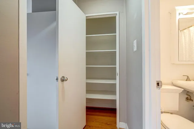 a bathroom with a toilet and a sink