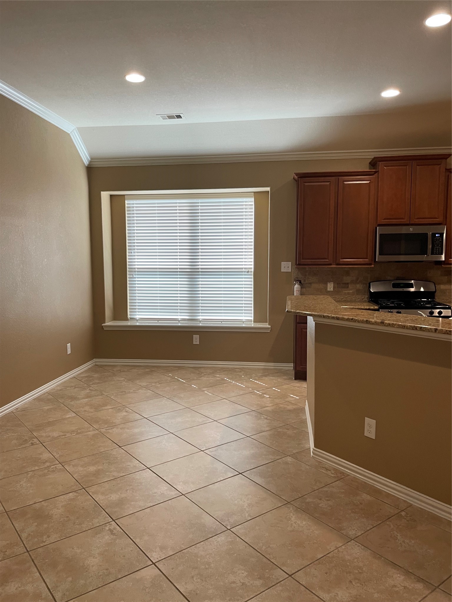 19518 Country Ranch Court Spring, TX 77388 - Photo 5 of 10 a view of a kitchen with a sink cabinets and a window