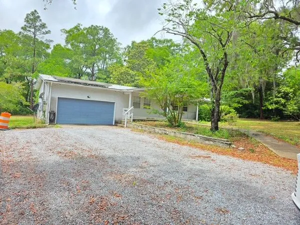a view of outdoor space and yard
