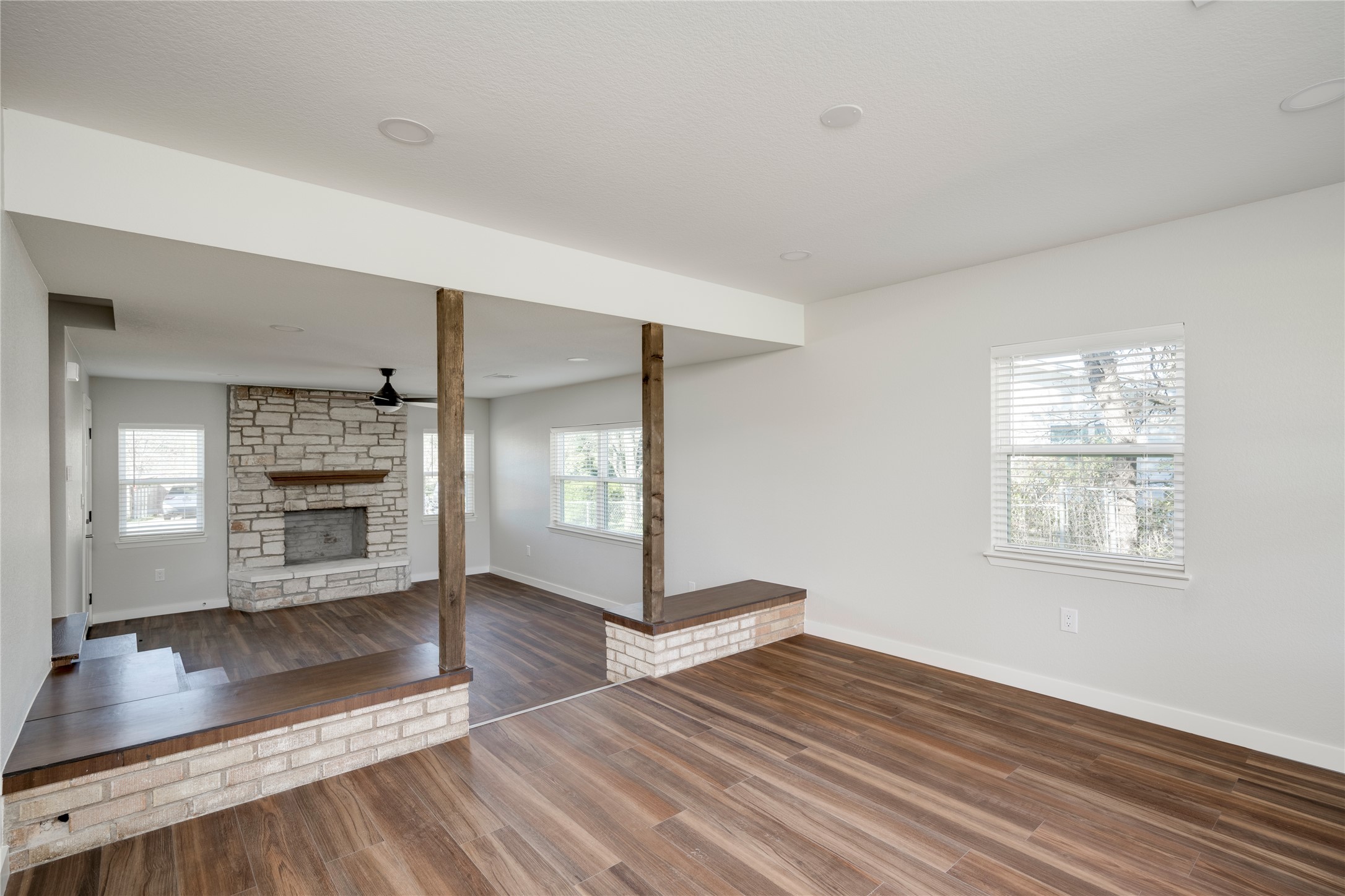 809 North West Street Burnet, TX 78611 - Photo 12 of 40 a view of a living room with hardwood floor and a ceiling fan