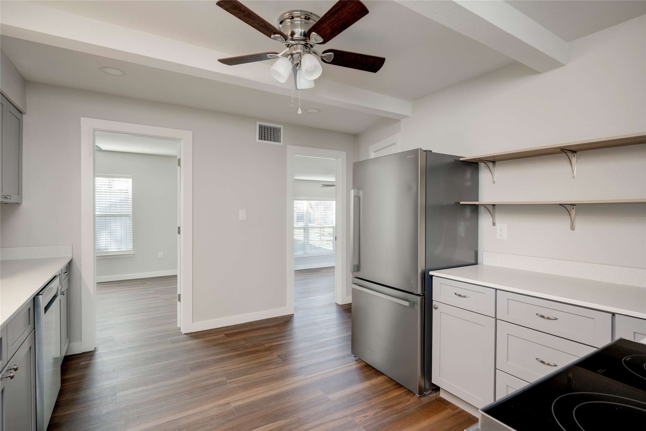 809 North West Street Burnet, TX 78611 - Photo 16 of 40 a view of a kitchen with a refrigerator and a sink