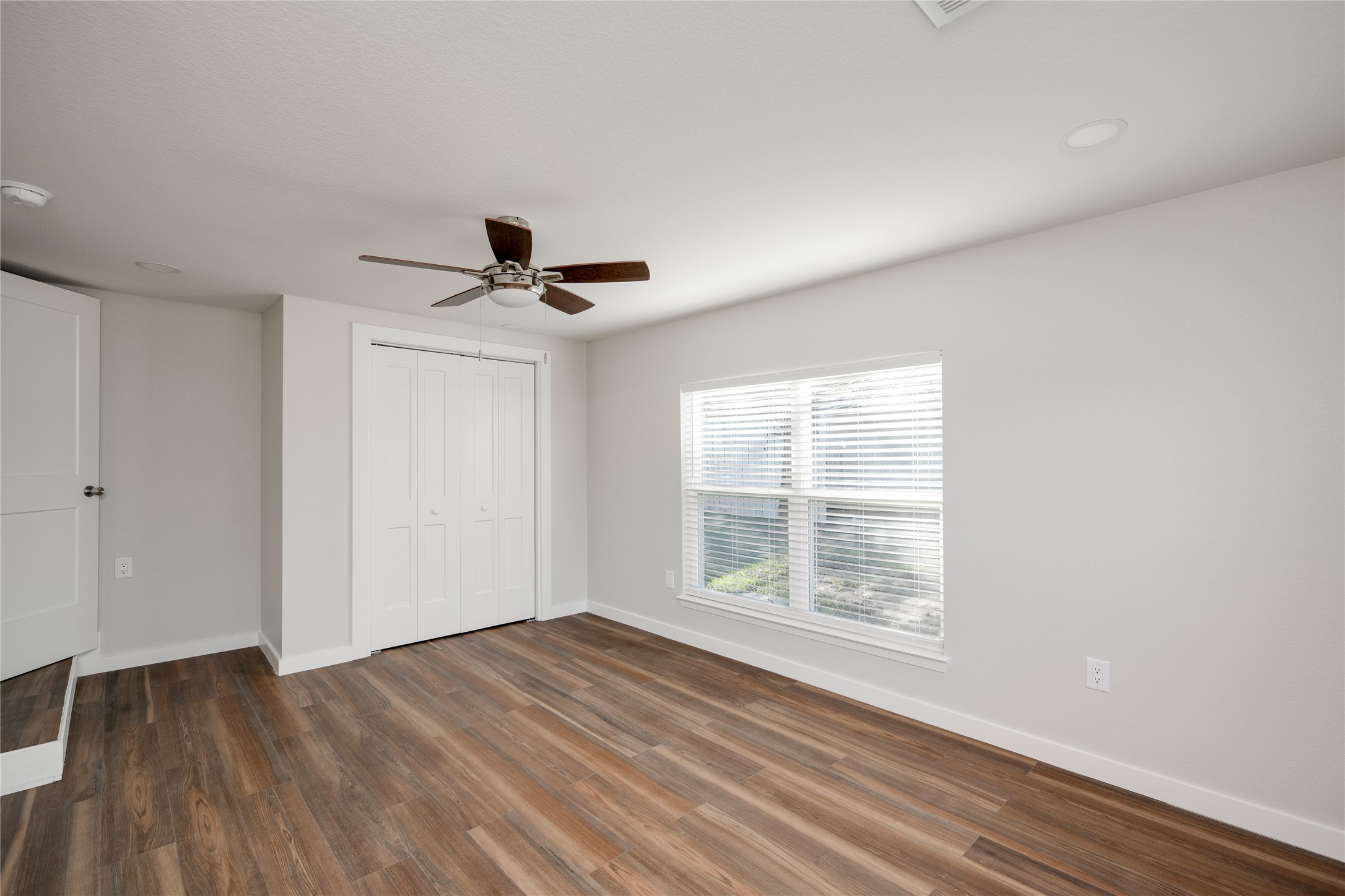 809 North West Street Burnet, TX 78611 - Photo 25 of 40 a view of empty room with wooden floor and fan