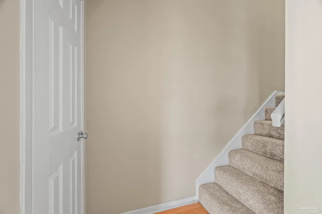 a view of entryway with stairs