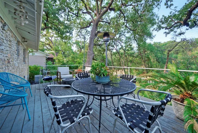 a view of a table and chairs in the patio