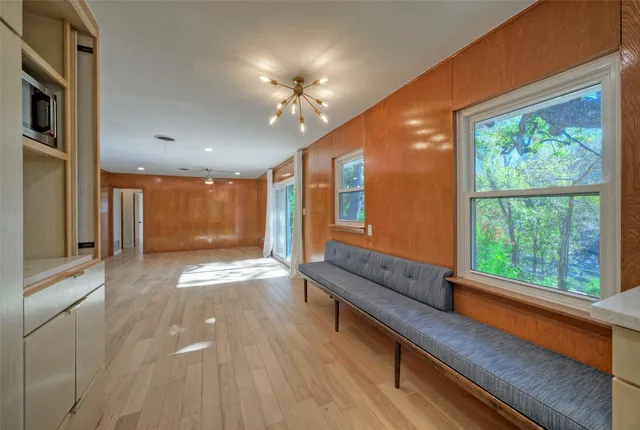 a view of hallway with a large window