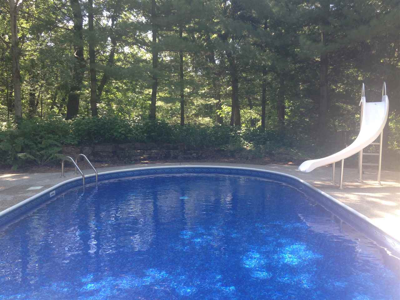 810 East Old Wagon Road Byron, IL 61010 - Photo 20 of 25 a view of outdoor space with swimming pool