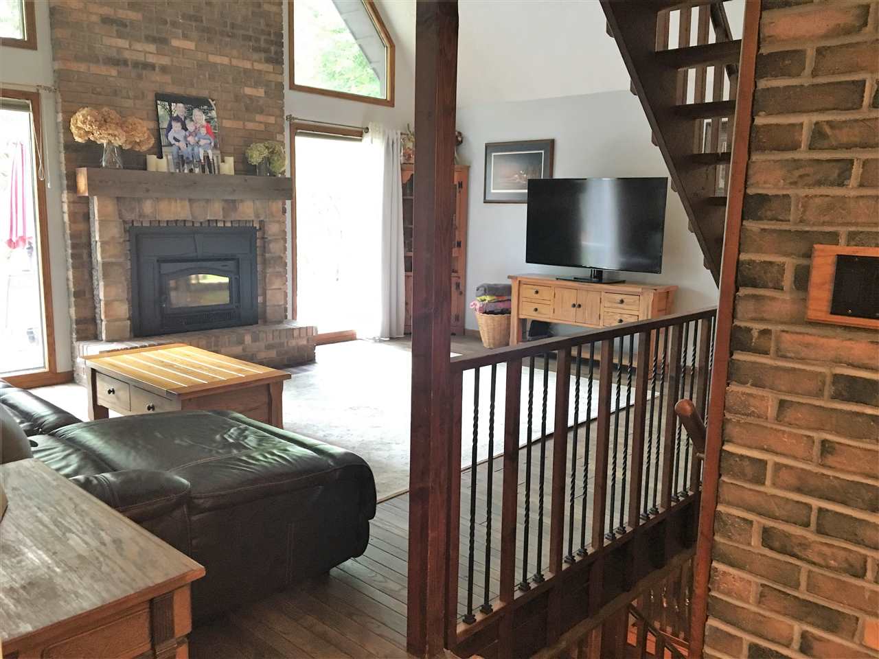 810 East Old Wagon Road Byron, IL 61010 - Photo 8 of 25 a view of a livingroom with furniture fire place and fire place