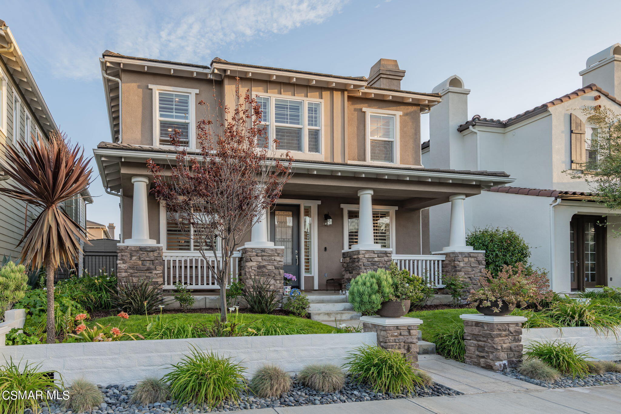 4064 Galapagos Way Oxnard, CA 93035 - Photo 1 of 55 a front view of a house with garden