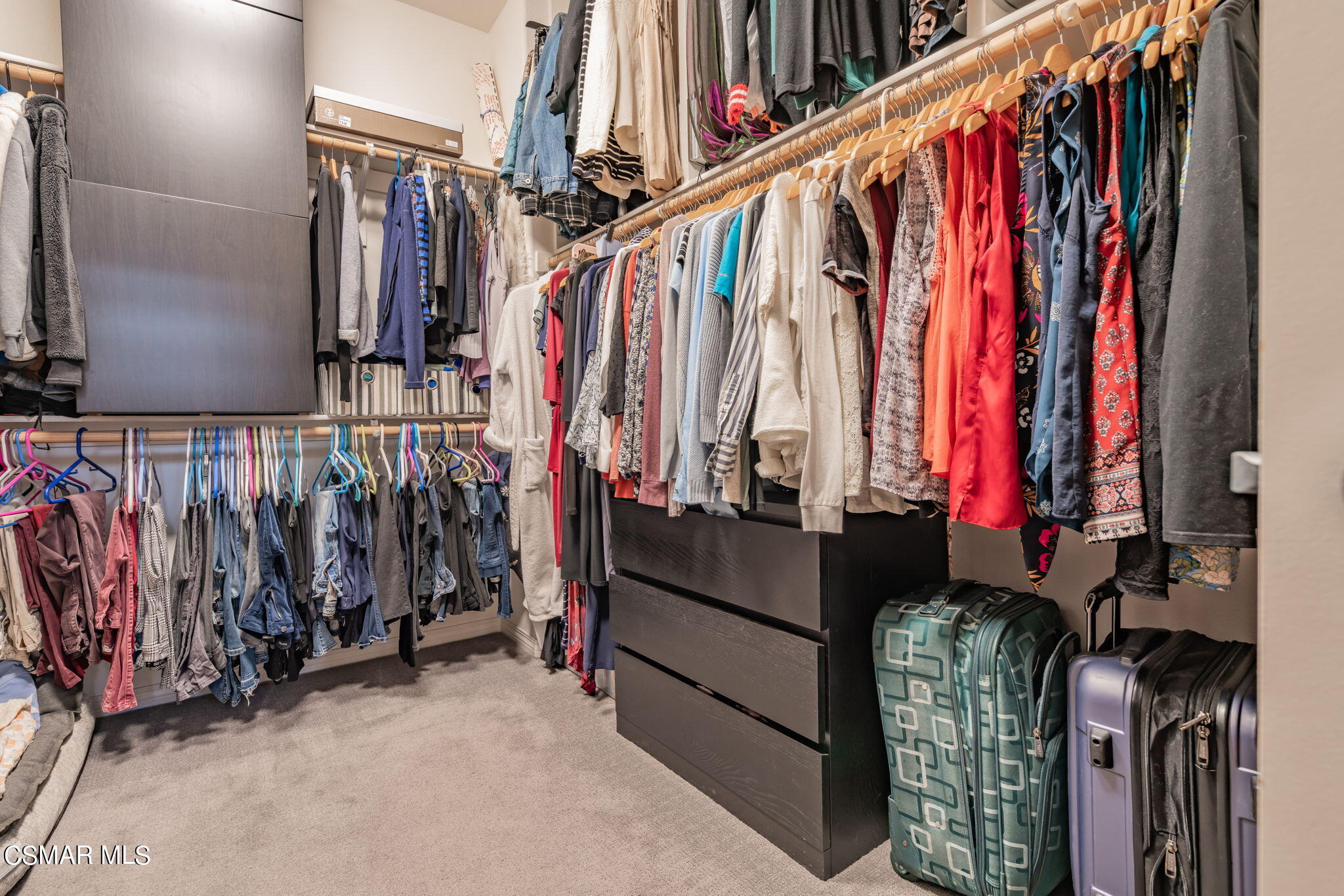 4064 Galapagos Way Oxnard, CA 93035 - Photo 32 of 55 a view of walk in closet with clothes