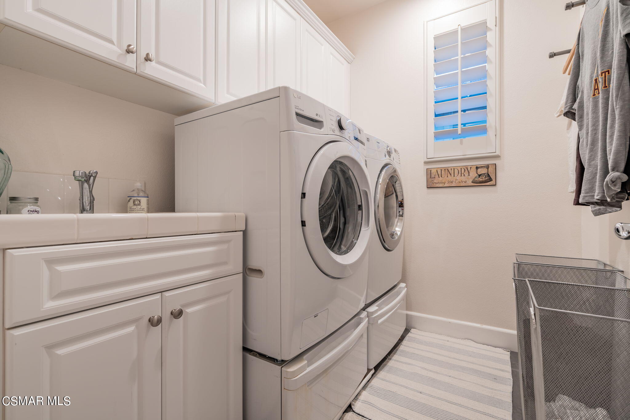 4064 Galapagos Way Oxnard, CA 93035 - Photo 41 of 55 a utility room with dryer and washer