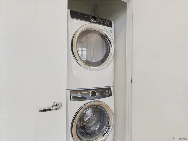 a view of a swimming pool and an outdoor seating