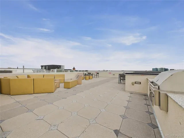 a view of a terrace with sitting area