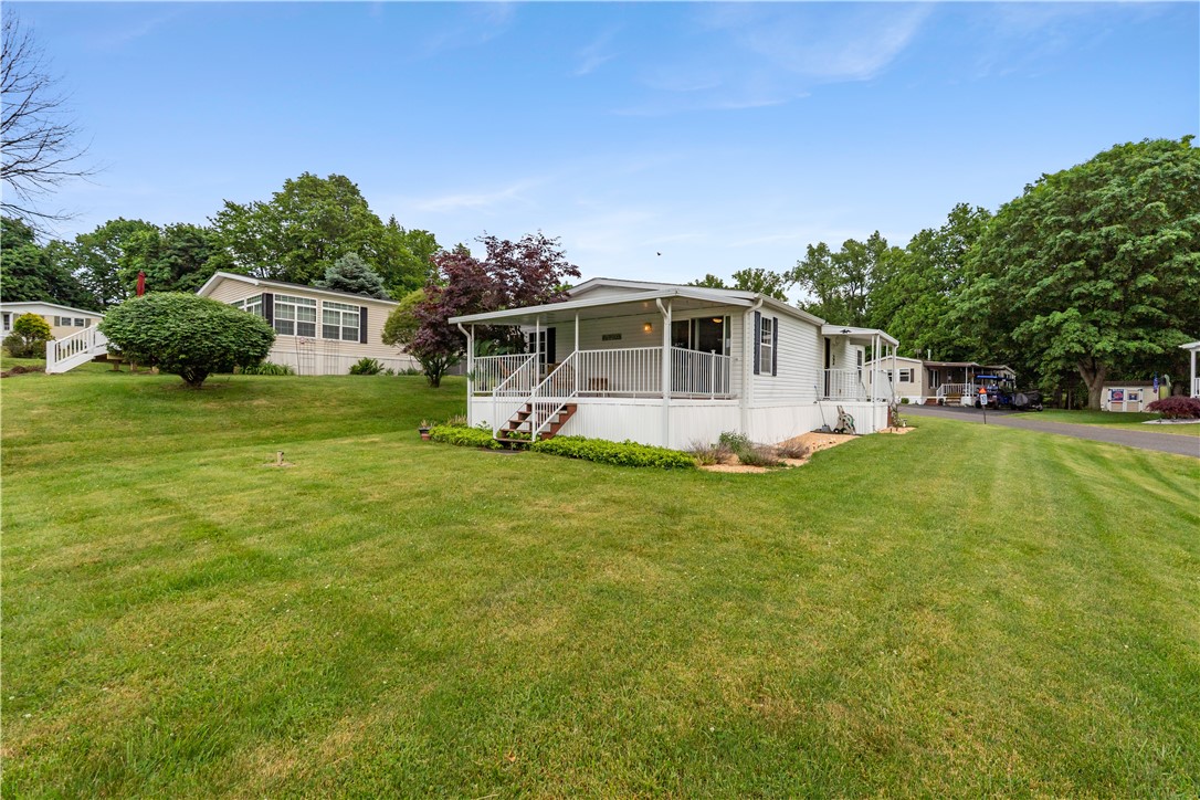 4795 East Lake Road, Unit 32 Livonia, NY 14487 - Photo 5 of 47 Large backyard off of the back porch.