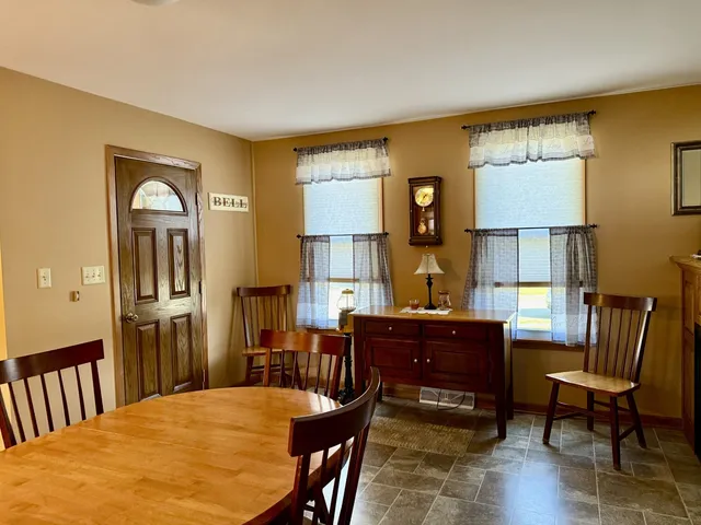 a view of a dining room with furniture