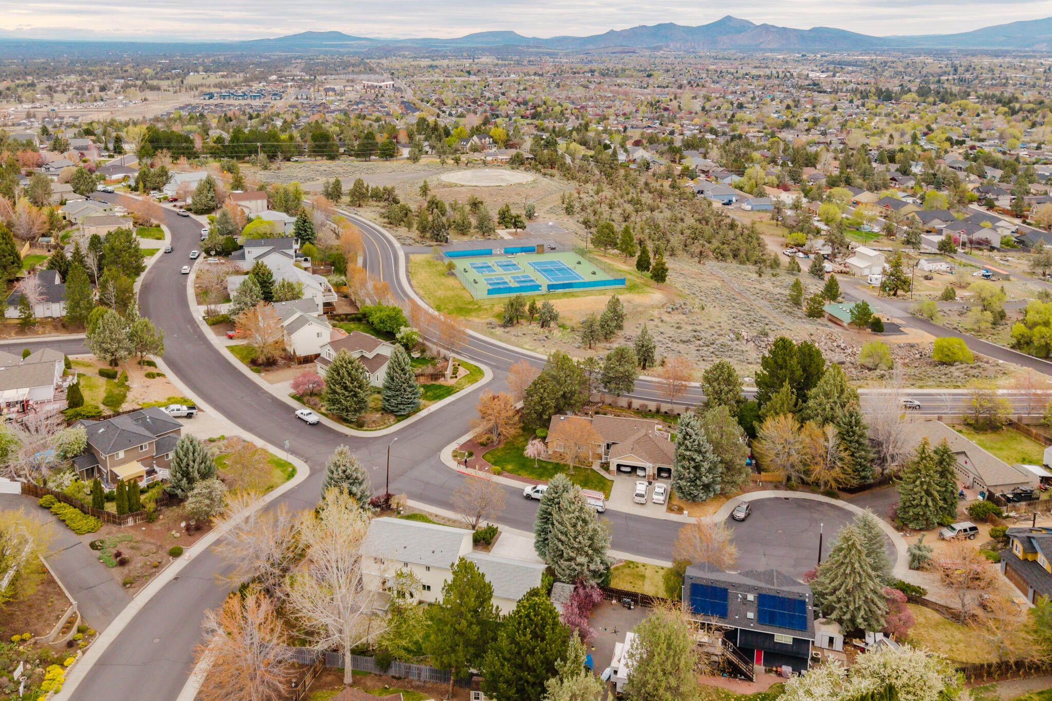 3626 Southwest Volcano Court Redmond, OR 97756 - Photo 70 of 89 This aerial provides perspective for the proximity of the city owned sports courts.
