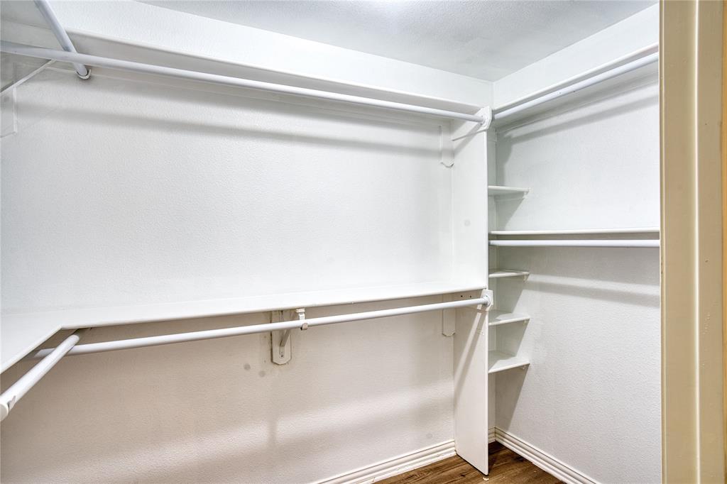 420 North Road Kennedale, TX 76060 - Photo 18 of 36 Spacious closet featuring dark wood finished floors