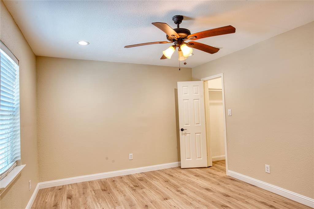 420 North Road Kennedale, TX 76060 - Photo 30 of 36 Unfurnished room featuring light wood-style floors, a ceiling fan, and recessed lighting