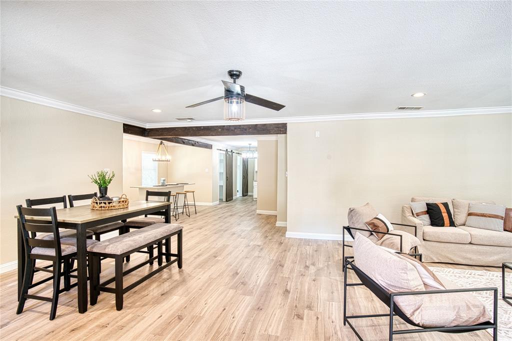 420 North Road Kennedale, TX 76060 - Photo 8 of 36 Dining area with recessed lighting, light wood-style floors, crown molding, and ceiling fan