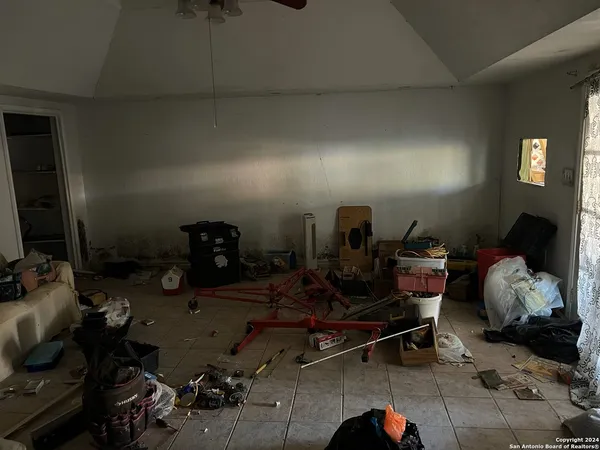 a living room with furniture and a window
