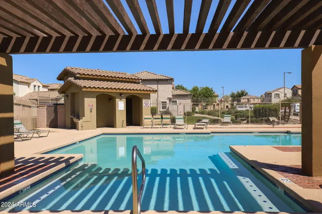 a picture of a bench in front of a microwave