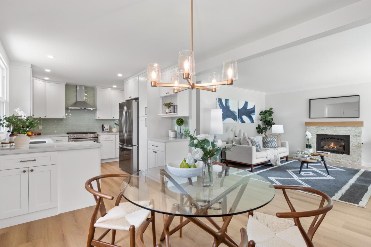 675 Linda Mar Boulevard Pacifica, CA 94044 - Photo 11 of 44 a view of a dining room with furniture and wooden floor