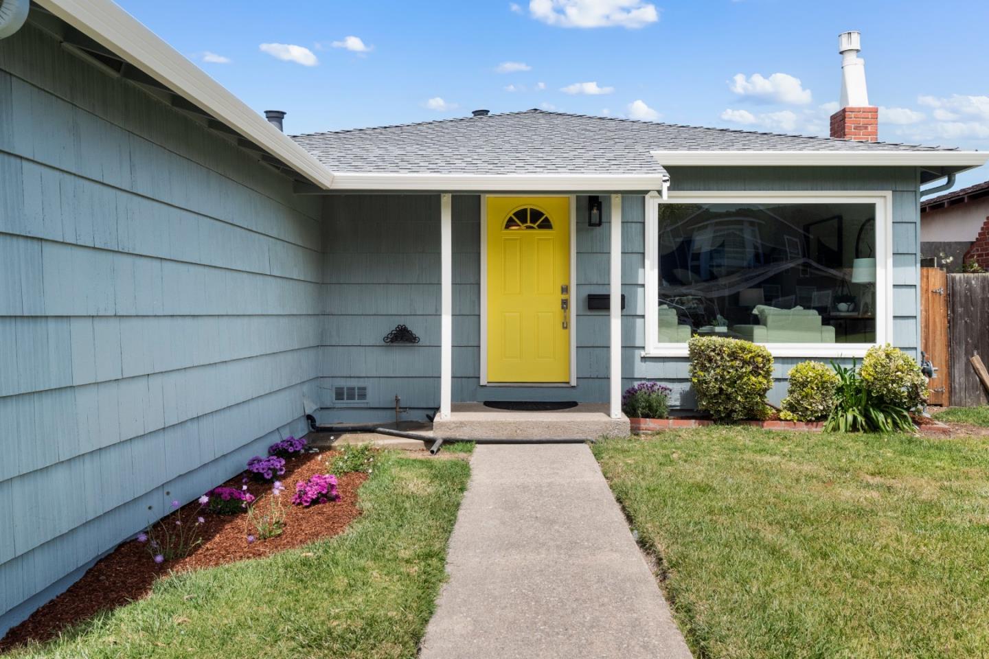 675 Linda Mar Boulevard Pacifica, CA 94044 - Photo 3 of 44 a front view of a house with a porch