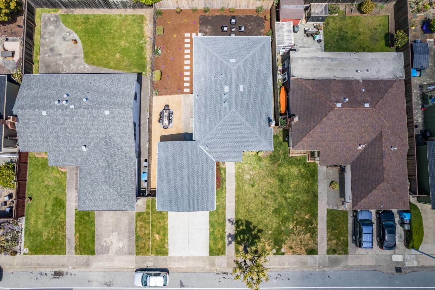 675 Linda Mar Boulevard Pacifica, CA 94044 - Photo 35 of 44 an aerial view of a house with a yard and plants