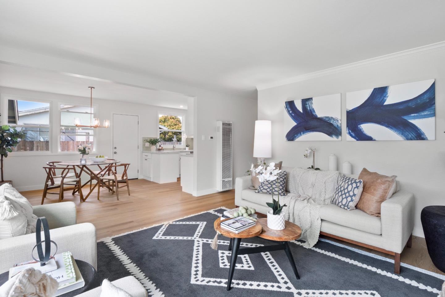 675 Linda Mar Boulevard Pacifica, CA 94044 - Photo 8 of 44 a living room with furniture and wooden floor