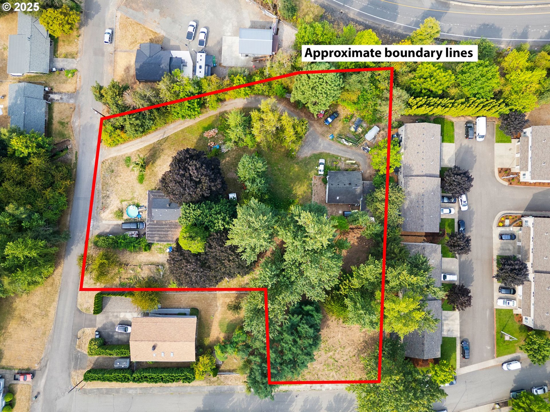 9000 Southeast Con Battin Road Happy Valley, OR 97086 - Photo 1 of 40 an aerial view of multiple house