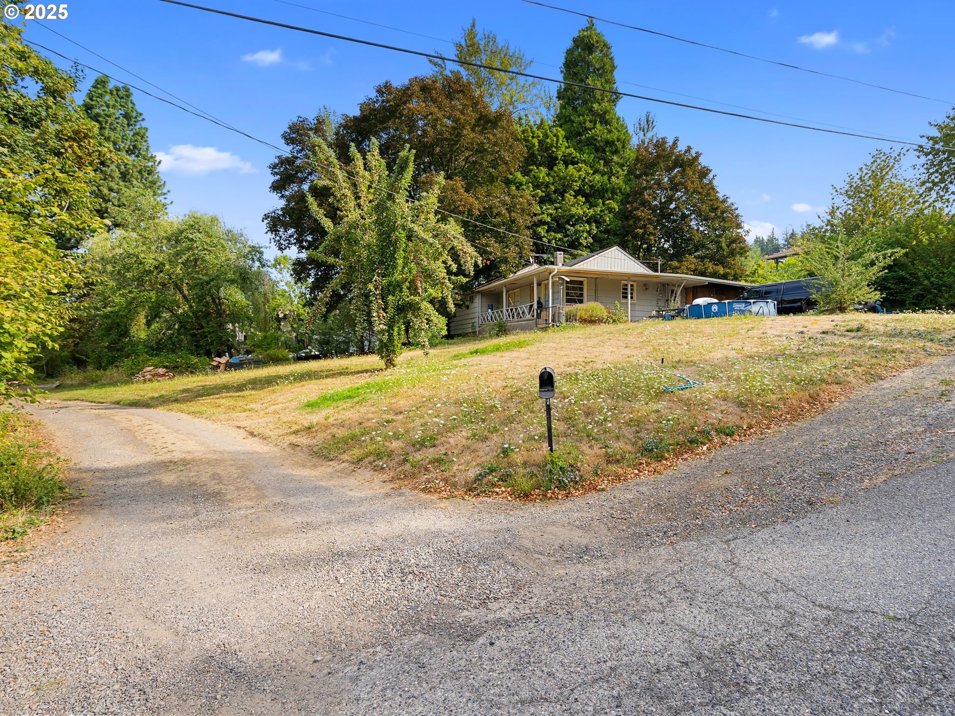 9000 Southeast Con Battin Road Happy Valley, OR 97086 - Photo 22 of 40 a front view of a house with a yard