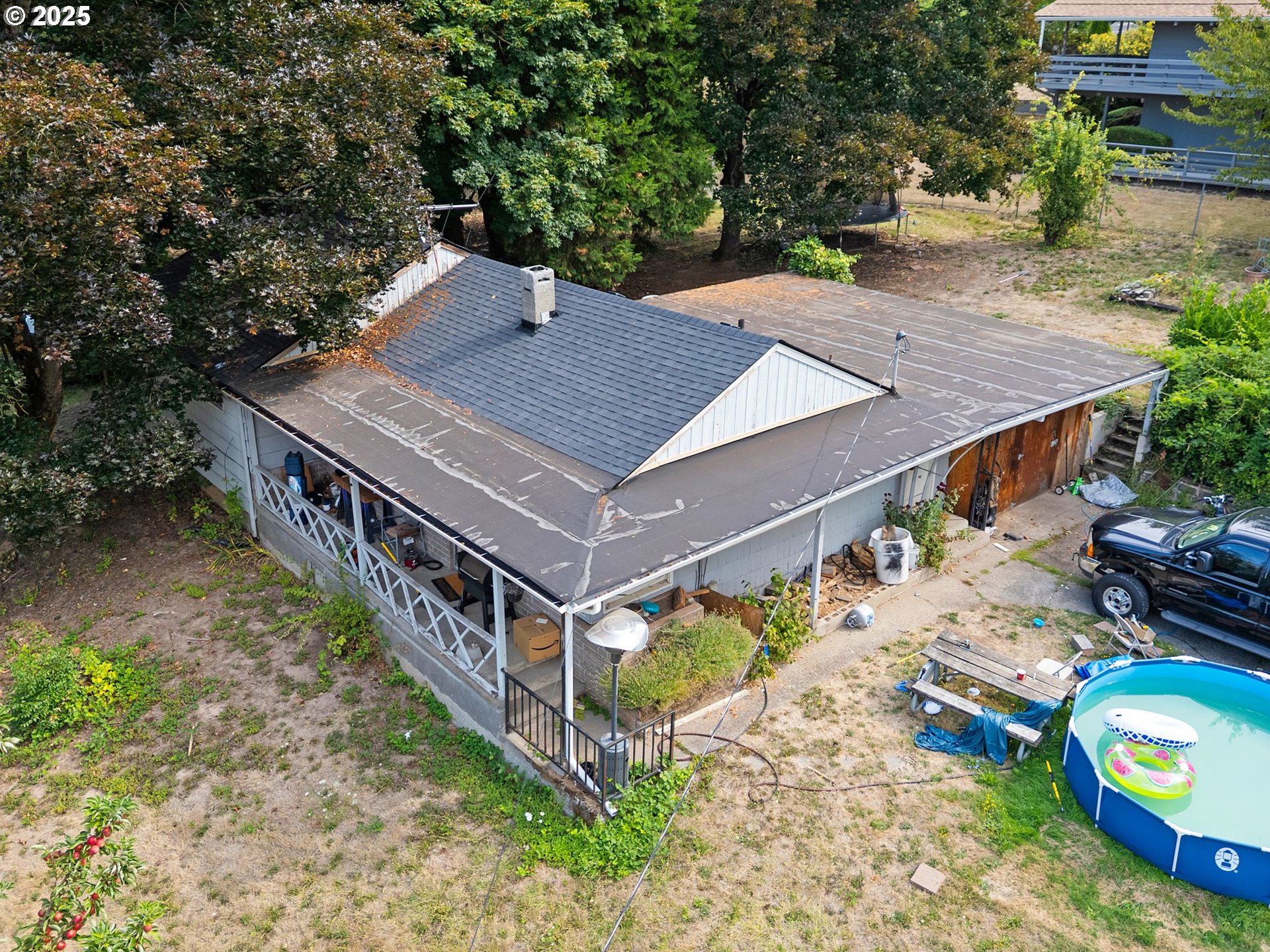 9000 Southeast Con Battin Road Happy Valley, OR 97086 - Photo 25 of 40 an aerial view of a house with a yard