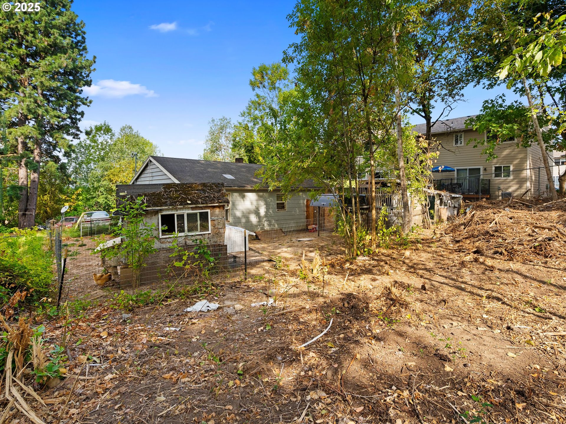 9000 Southeast Con Battin Road Happy Valley, OR 97086 - Photo 37 of 40 a view of a house with a yard