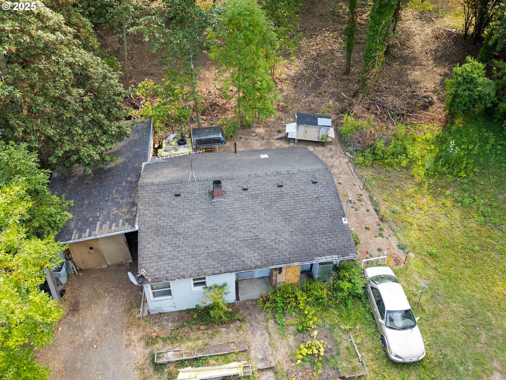 9000 Southeast Con Battin Road Happy Valley, OR 97086 - Photo 5 of 40 an aerial view of a house with a yard