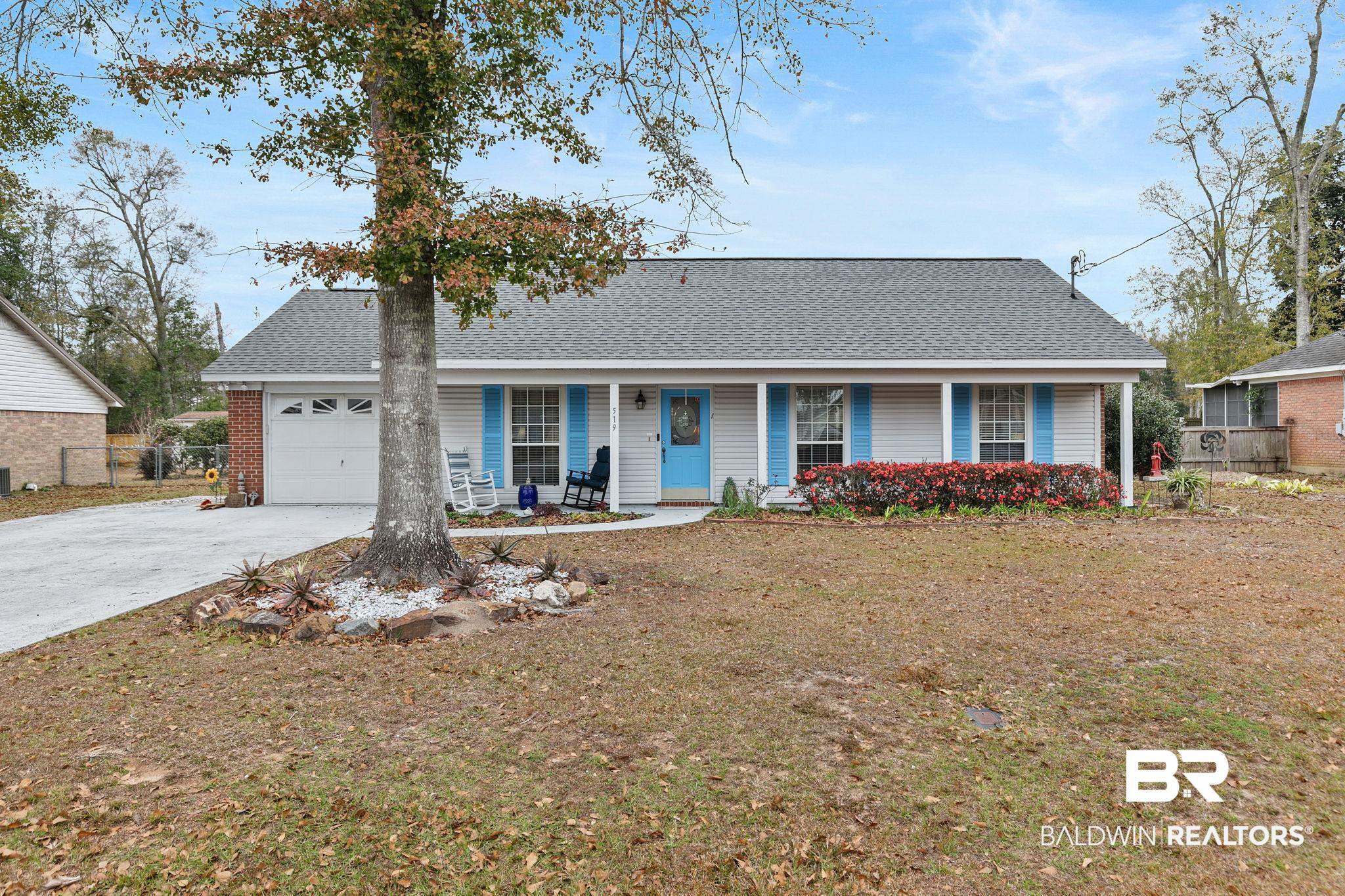 519 Juniper Place Drive Foley, AL 36535 - Photo 3 of 47 Single story home with covered porch, driveway, and an attached garage