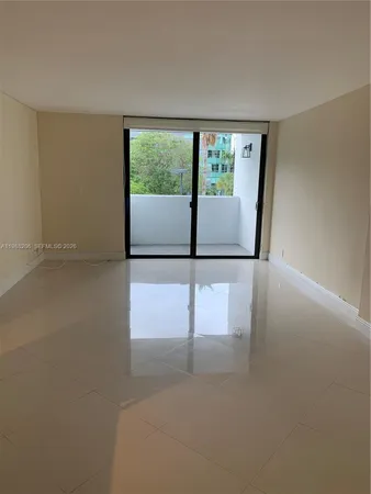 a view of a room with a window