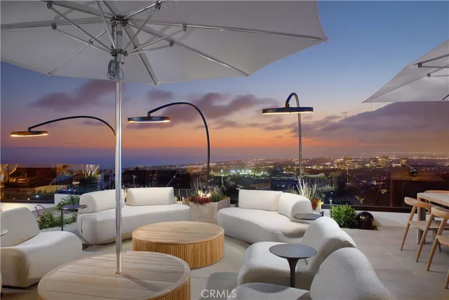 a living room with furniture and a garden