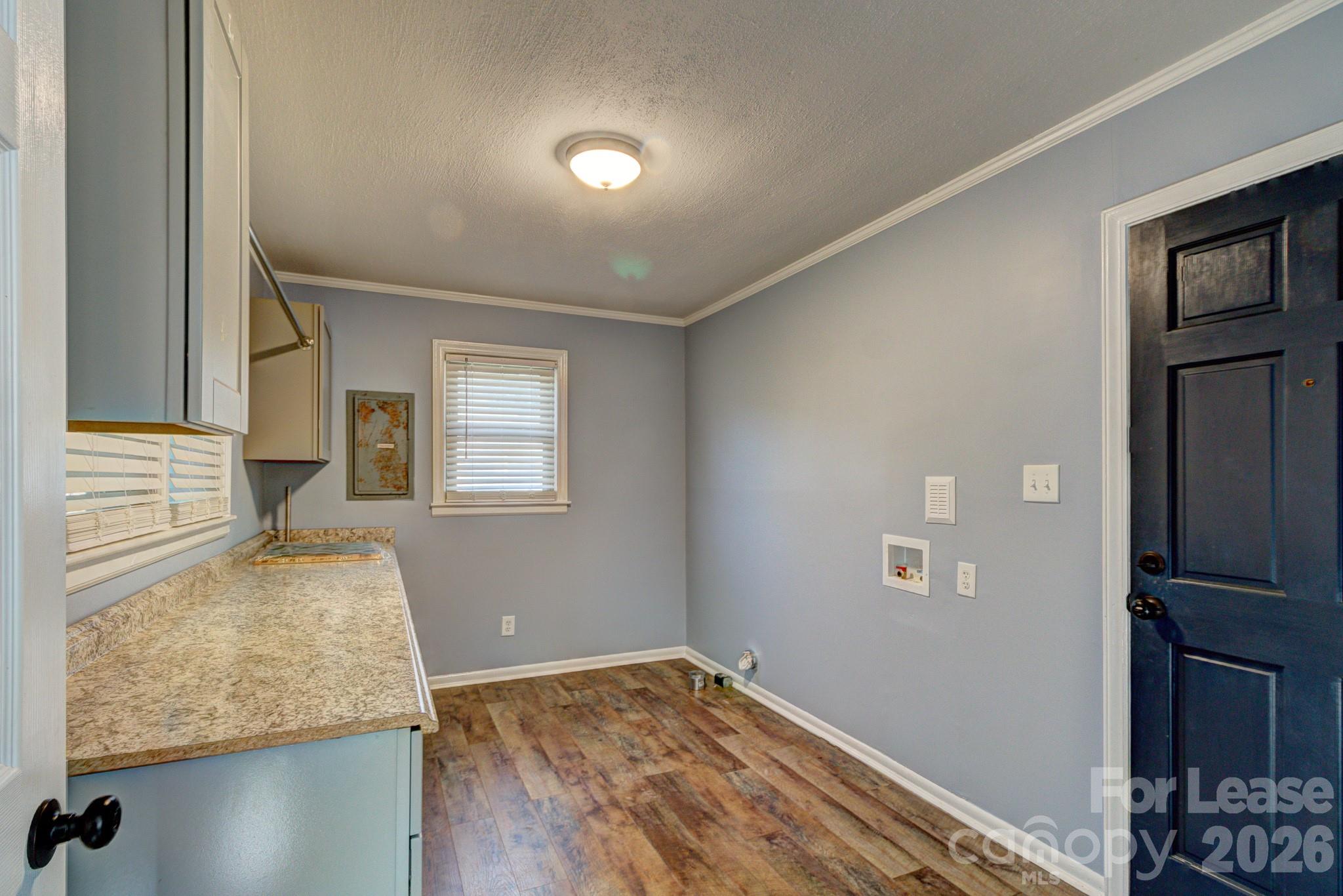 1409 Delview Road Cherryville, NC 28021 - Photo 16 of 19 a view of a livingroom with wooden floor and a window