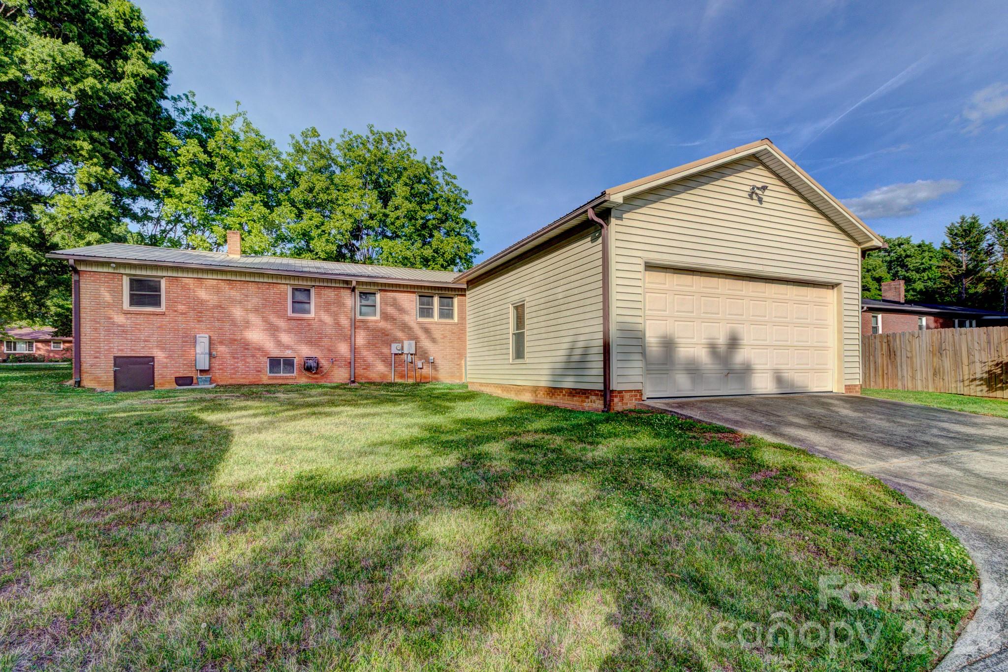 1409 Delview Road Cherryville, NC 28021 - Photo 18 of 19 a front view of a house with garden