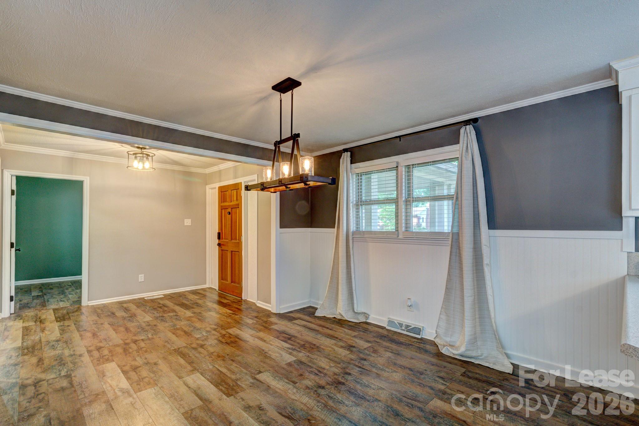 1409 Delview Road Cherryville, NC 28021 - Photo 6 of 19 a view of a livingroom with a chandelier