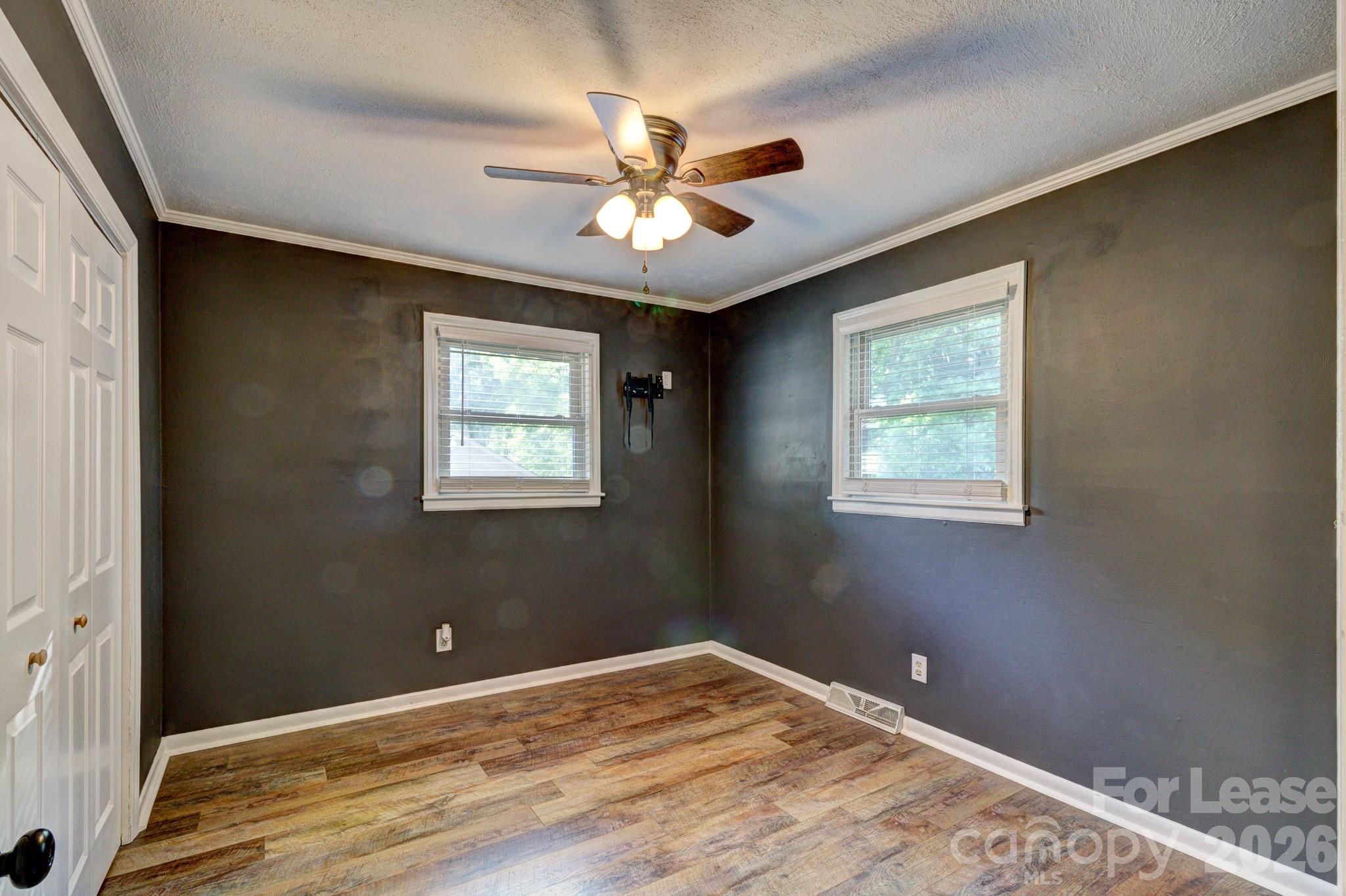 1409 Delview Road Cherryville, NC 28021 - Photo 10 of 19 a view of an empty room with window and chandelier fan