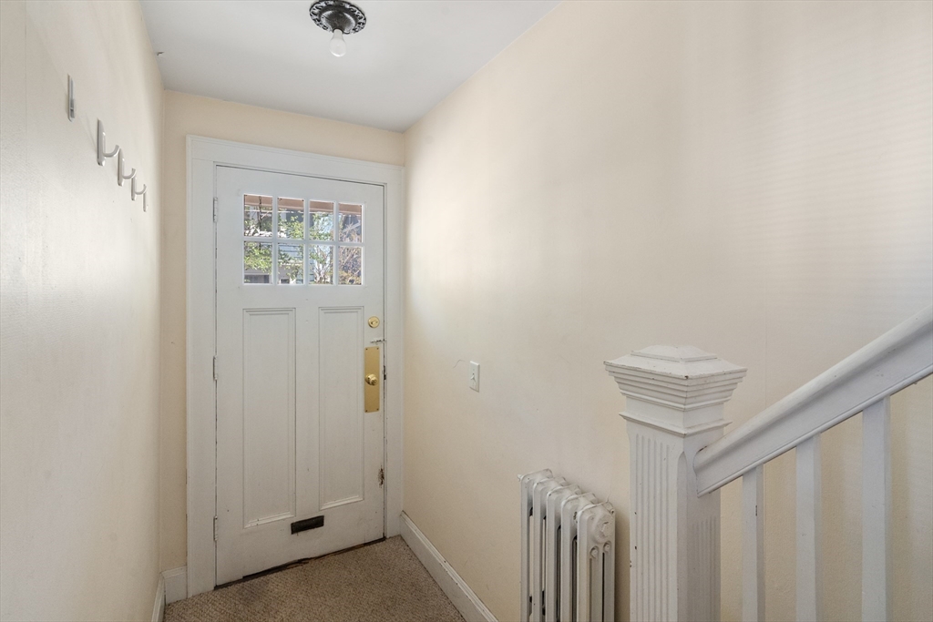9 Searle Avenue Brookline, MA 02445 - Photo 13 of 35 a view of an entryway with hallway